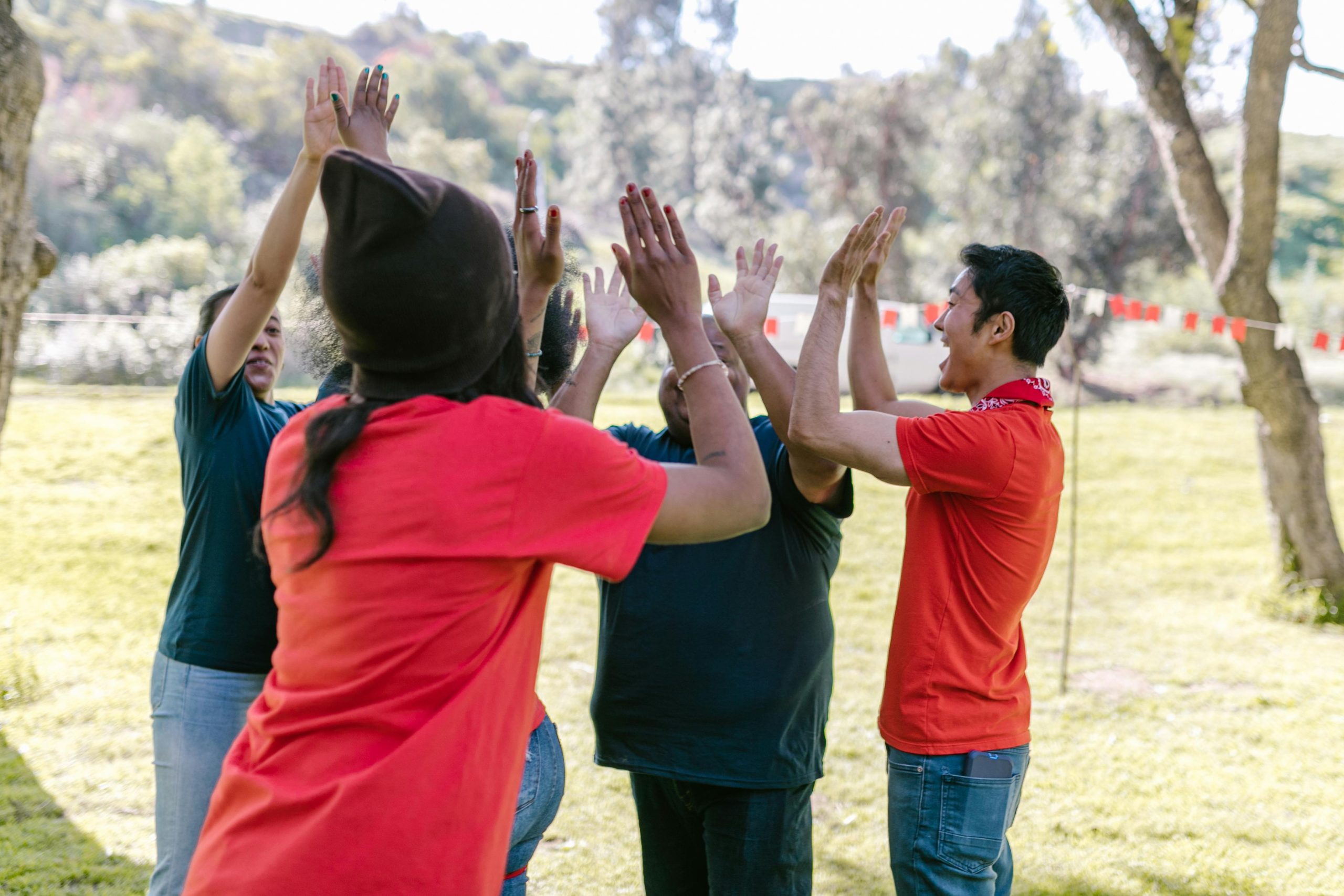 Group of People Doing High Five